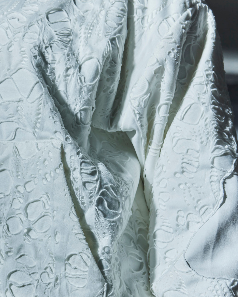 Close-up of print and fabric texture on Bite Me oversized hoodie – Volfsbane streetwear for women