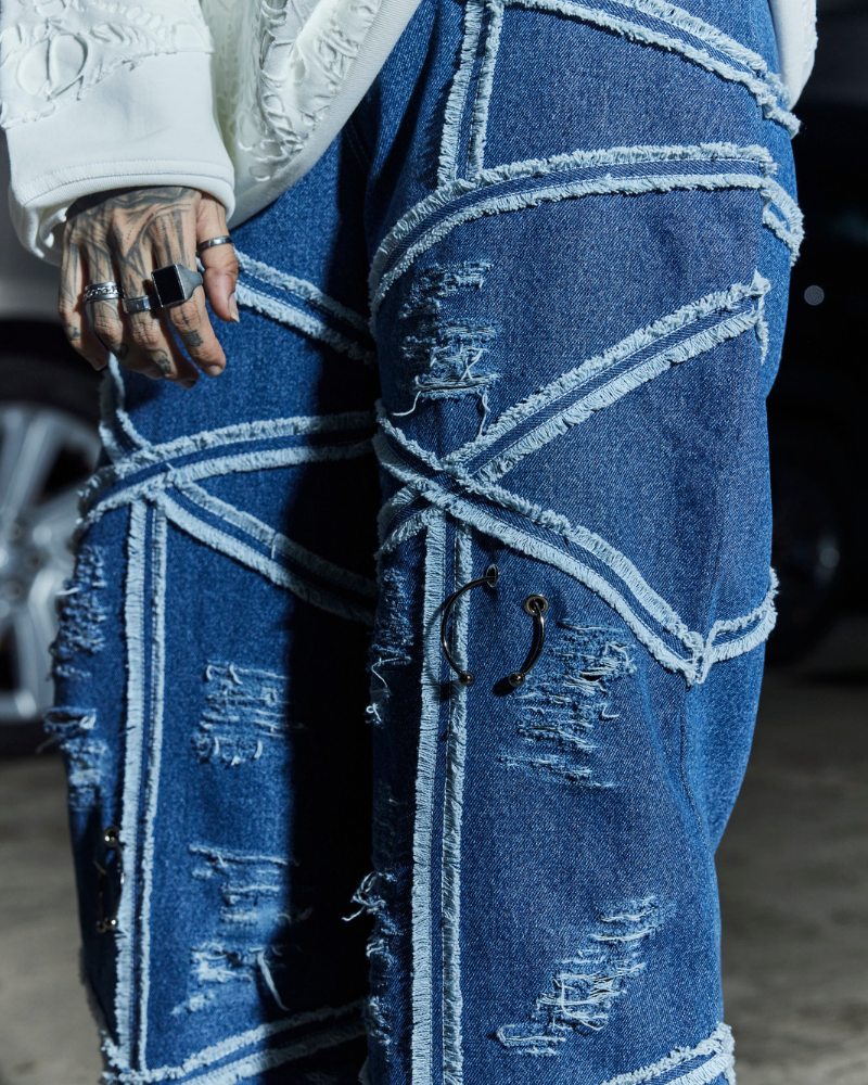 Close-up of stitching and fabric detail on Criss oversized denim pants – Volfsbane streetwear for women