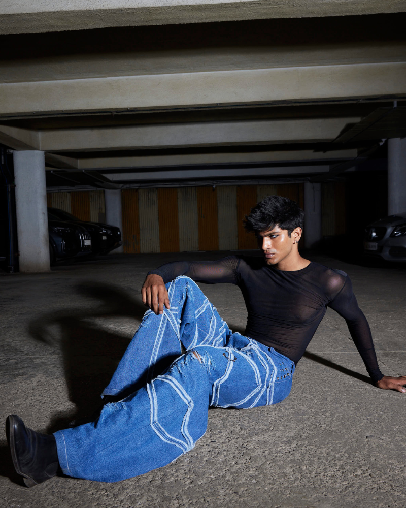 male model wearing Criss oversized denim pants front view – Volfsbane streetwear India
