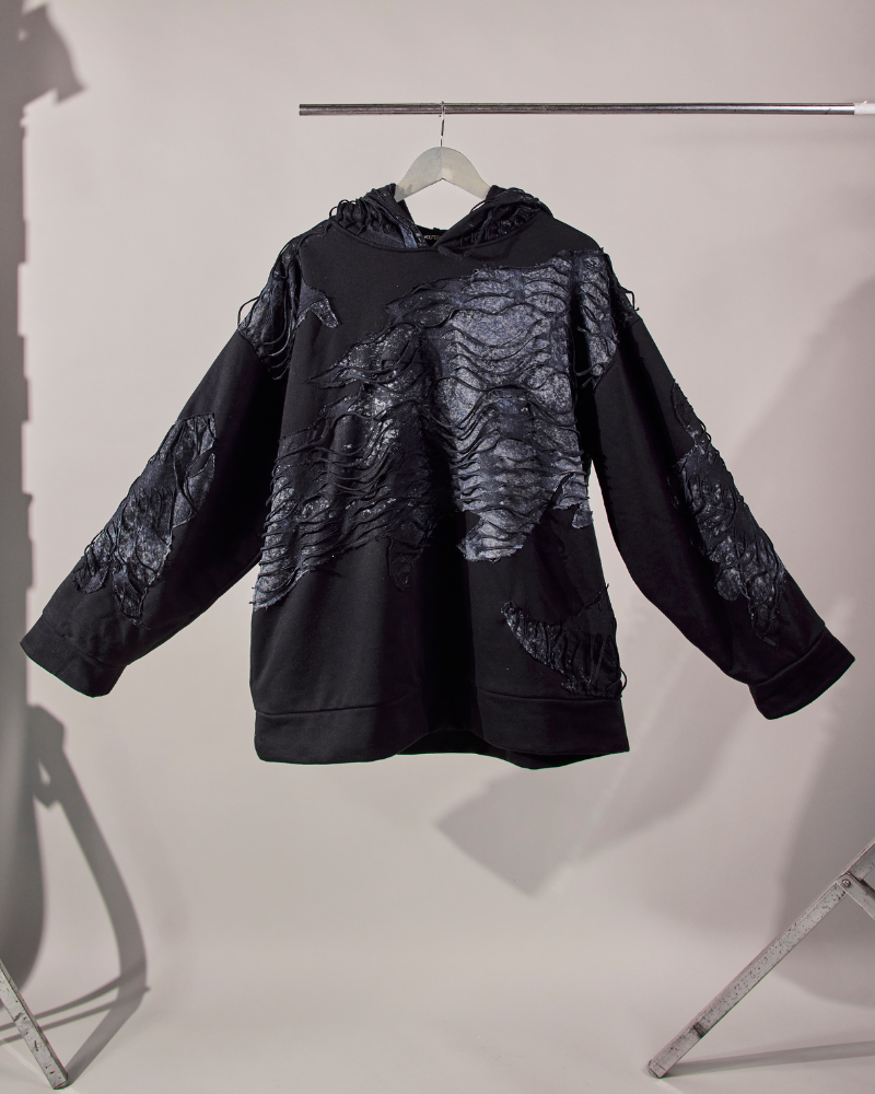 Front view of Awake oversized hoodie for men with bold graphic print – Volfsbane streetwear India
