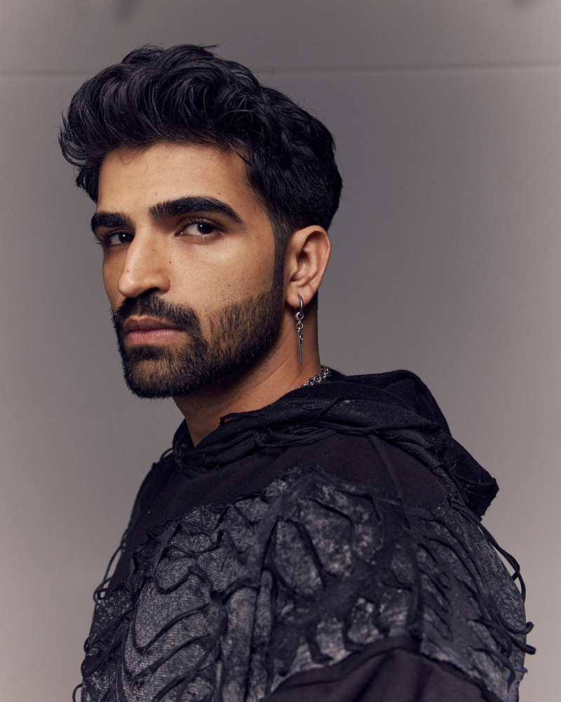 Close-up of male model’s face in Awake oversized hoodie – Volfsbane streetwear India


