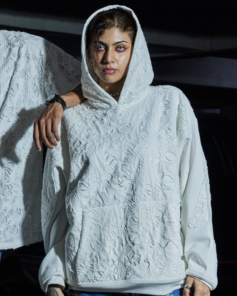 Female model wearing Bite Me oversized hoodie front view – Volfsbane streetwear for women India