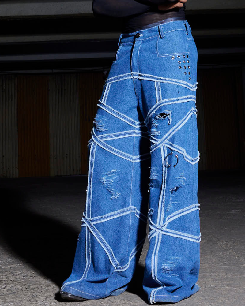 Alternate front pose of female model in Criss oversized denim pants – Volfsbane streetwear

