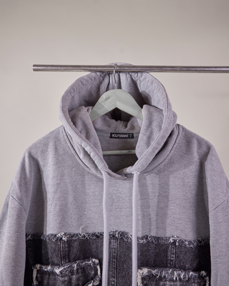 Detail of pocket and sleeve stitching on raw denim hoodie – Volfsbane fashion India