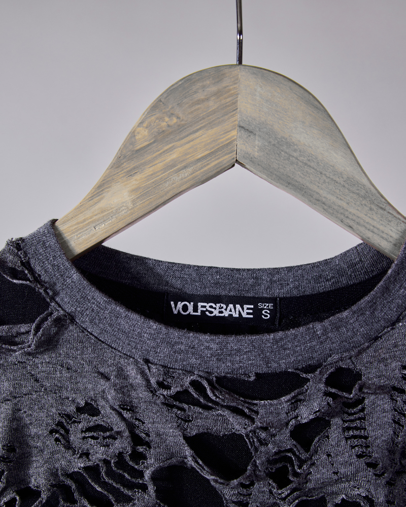 Close-up of raw ripped fabric on grey Torn oversized T-shirt – Volfsbane streetwear India
