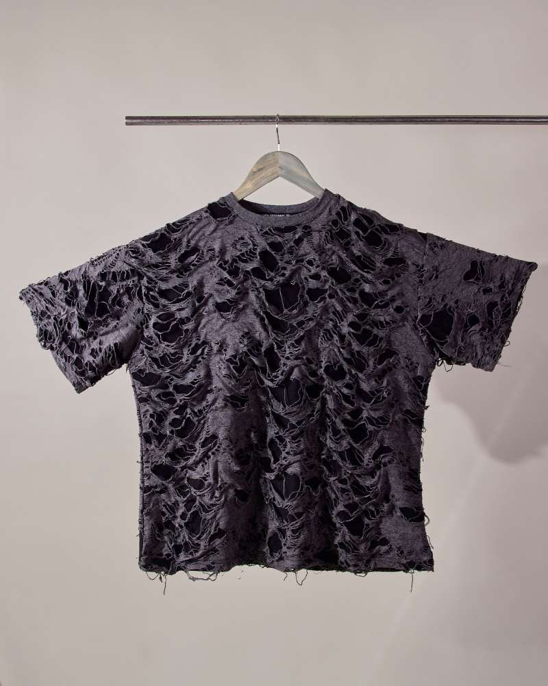 Front view of grey Torn oversized T-shirt with raw ripped detailing – Volfsbane streetwear
