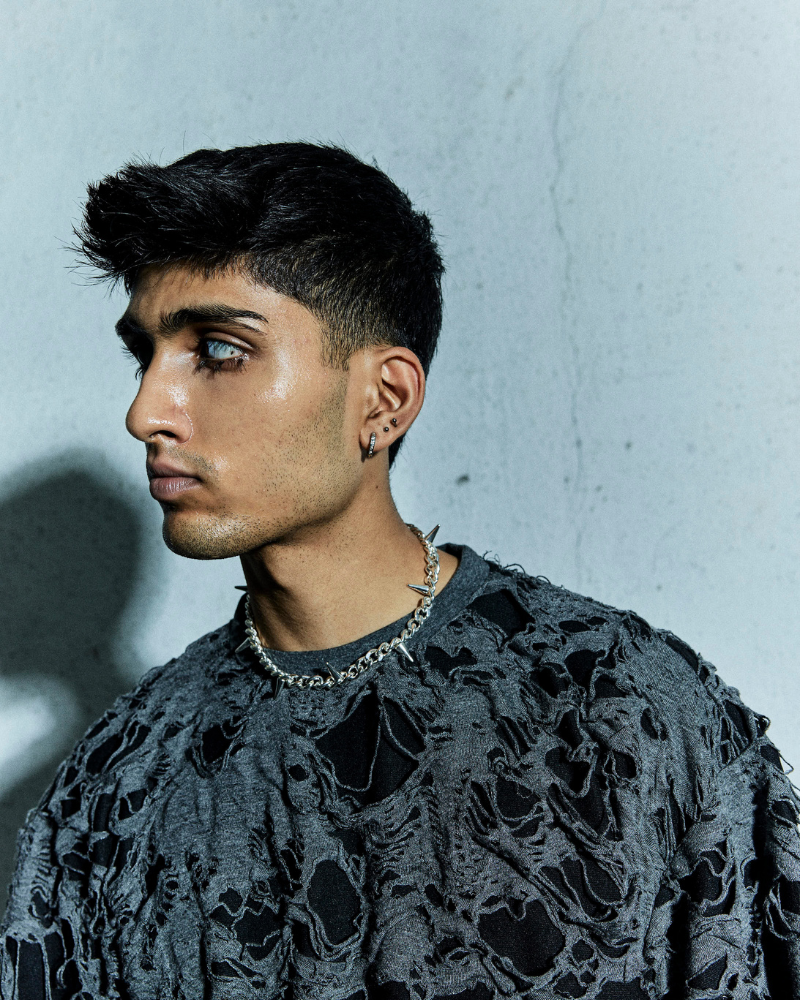 Alternate front pose of male model in grey Torn oversized T-shirt – Volfsbane streetwear India.
