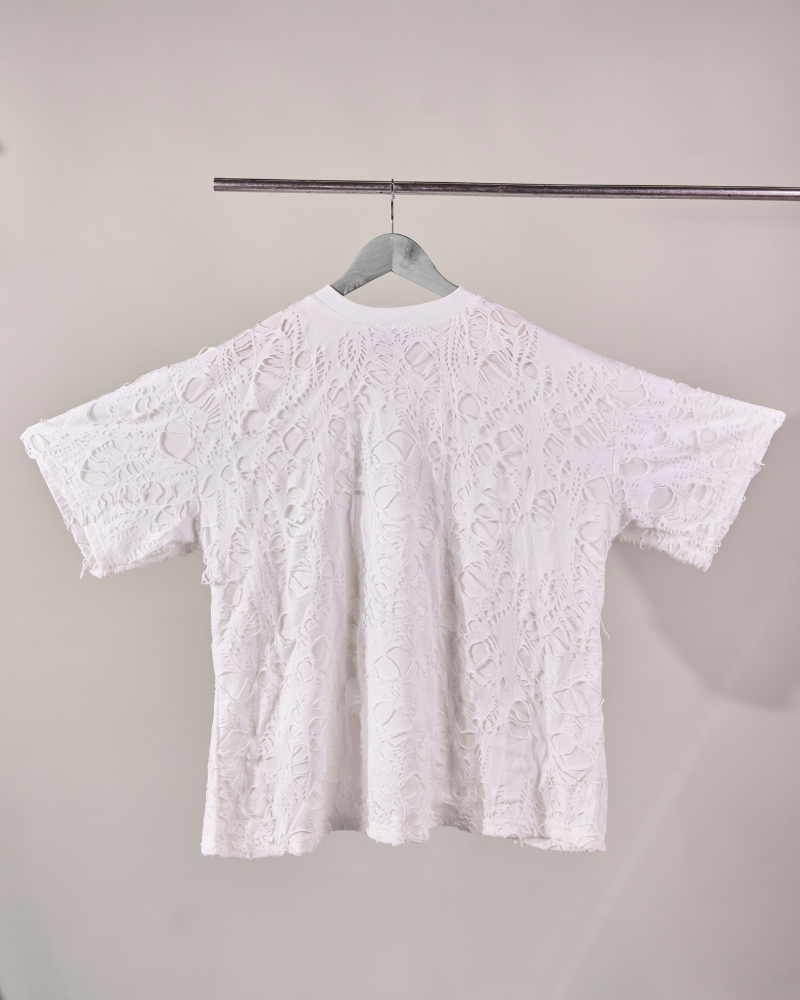 Back view of white Torn oversized T-shirt – Volfsbane grunge streetwear for men and women
